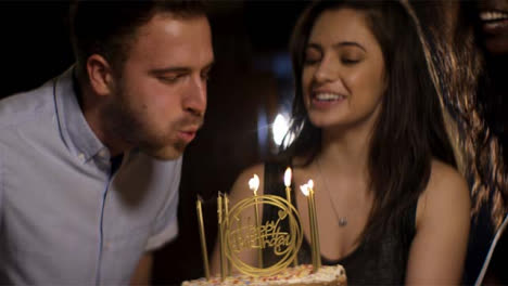 Young-Man-Blows-Out-Birthday-Cake-Candles02