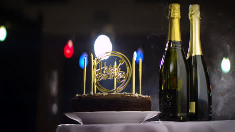 Birthday-Cake-With-Candles-Blown-Out-On-Table-