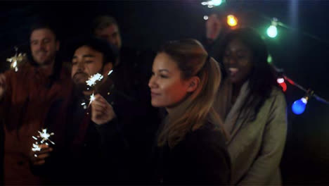 Group-of-Friends-Dance-With-Sparkler