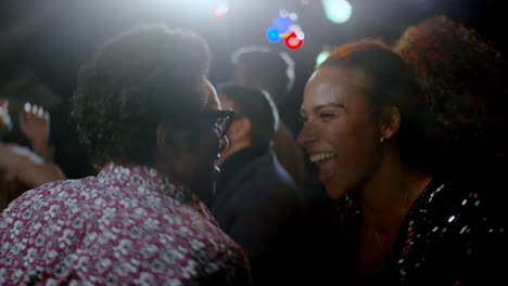 Young-Man-and-Woman-Smile-and-Dance