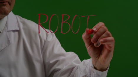 Hombre-escribiendo-Word-Robotics-en-pantalla-verde