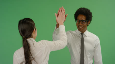 Man-and-Woman-in-Shirts-Hi-Five-in-Slow-Motion