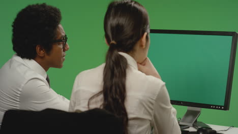 Colleagues-Look-Concerned-at-Computer-on-Green-Screen