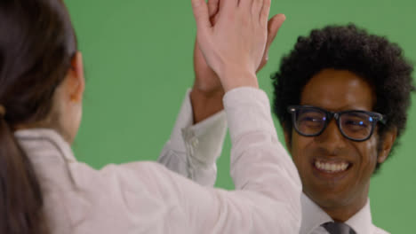 CU-Two-people-high-5-on-Green-Screen