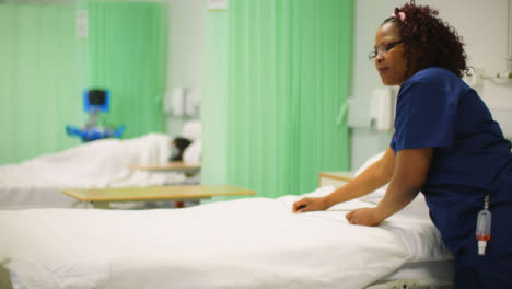 Nurse-Making-Hospital-Ward-Bed