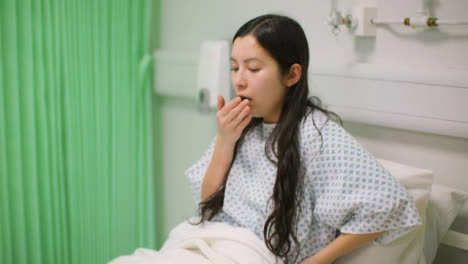 Sick-Female-Patient-in-Hospital-Bed