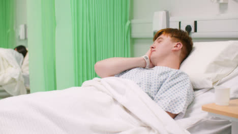 Sick-Male-Patient-in-Hospital-Bed