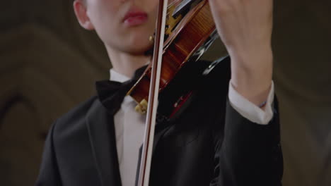 Tilt-Up-To-Male-Playing-Violin