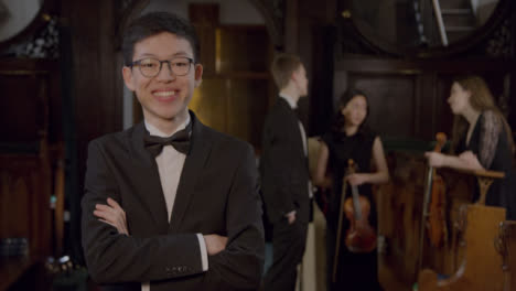 Male-Classical-Musician-Smiling-to-Camera