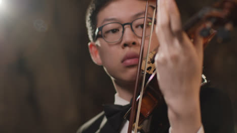 Close-Up-Of-Male-Violinist-During-A-Performance