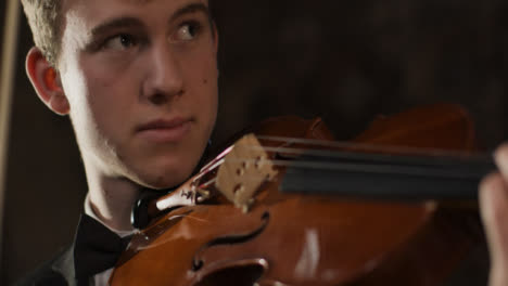 Close-Up-Of-Male-Violinist-Waiting-To-Play