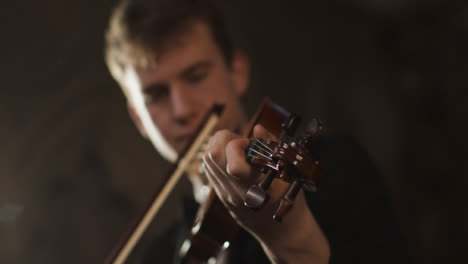 Close-Up-Top-Of-Violin-Being-Played-By-Violinist