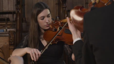 Panning-Shot-String-Quartet-Playing-Music