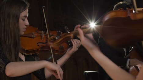 Panning-Shot-Female-Violinist-Playing-in-String-Quartet