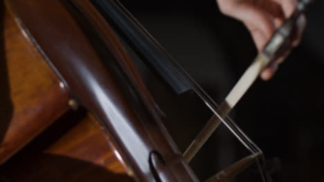 Side-View-Close-Up-Male-Cellist-During-Performance-