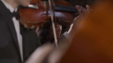 Tracking-In-From-Cello-to-Female-Violinist