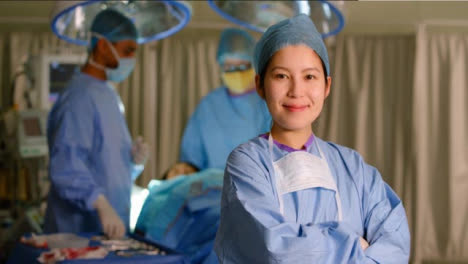 Portrait-of-Smiling-female-Surgeon