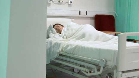 Patient-Asleep-in-Hospital-Bed