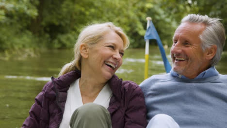 Close-Up-of-Middle-Aged-Tourist-Couple-Enjoying-Pedal-Boat