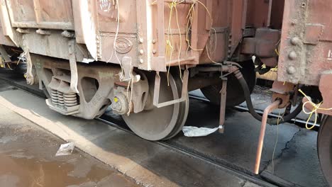 Closeup-view-of-the-wheels-of-a-goods-train