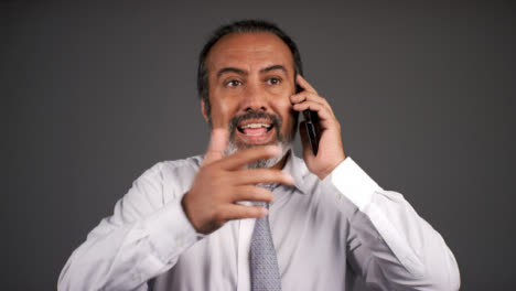Smart-Frustrated-Middle-Aged-Man-Shouting-On-Phone