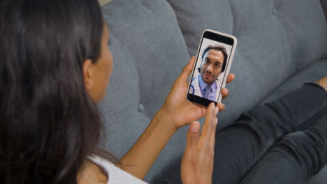 Young-Woman-Having-Video-Call-with-a-Doctor