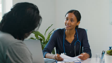 Female-Doctor-Discusses-Results-With-Patient