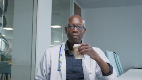 Middle-Aged-Doctor-Listening-During-Video-Call-Meeting