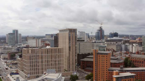 Drone-Shot-Rising-Over-Buildings-In-Birmingham-City-Centre-01