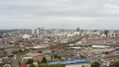 Drone-Shot-Looking-Over-Birmingham-City-Skyline-In-England-01
