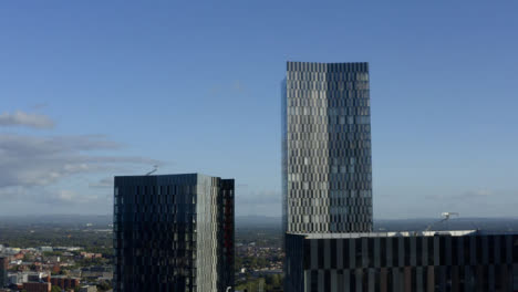 Drone-Shot-Rising-Up-Manchester-Skyscrapers-02