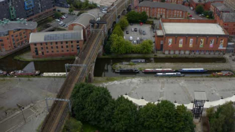 Drone-Shot-Approaching-Boats-At-Castlefield-Canals