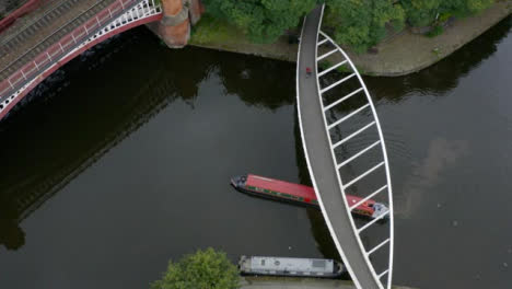 Overhead-Drone-Shot-Orbiting-Boat-At-Castlefield-Canals-01