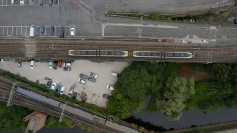 Overhead-Drone-Shot-Tracking-Train-Travelling-Through-Castlefield-Canals-03