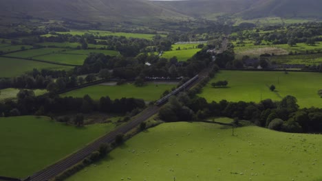 Drone-Shot-Tracking-Train-Travelling-Through-Peak-District-01