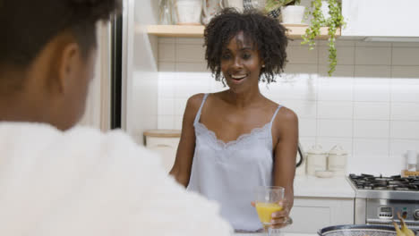 Parents-Watch-Their-Teenage-Daughter-Prepare-Her-Breakfast