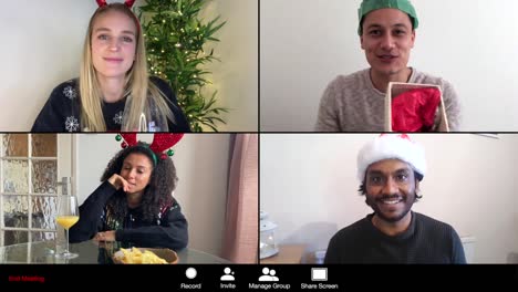 4-Way-Split-Screen-Christmas-Group-Call-As-Man-Opens-Present-and-Others-React