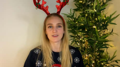 Young-Woman-On-Christmas-Video-Call-Talking-Directly-into-Camera