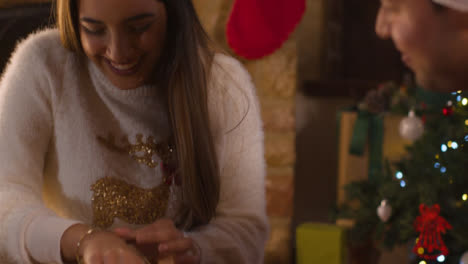 Close-Up-Shot-of-Young-Woman-Reacting-to-Bracelet-Christmas-Gift-From-Boyfriend