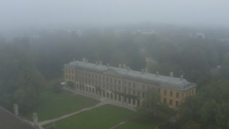 Drone-Shot-Pulling-Away-From-Buildings-In-Misty-Oxford-02