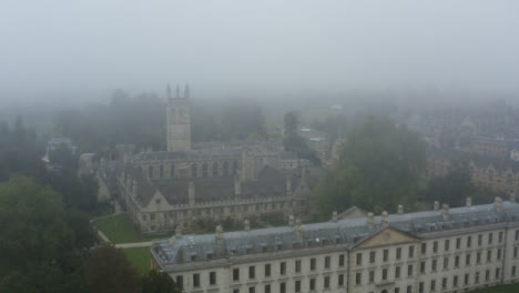 Drone-Shot-Pulling-Away-From-Buildings-In-Misty-Oxford-03