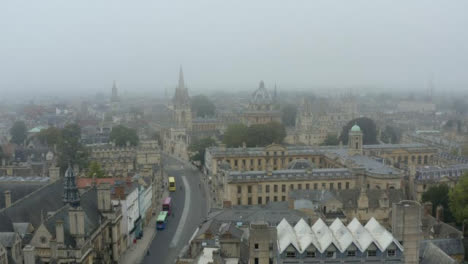 Drone-Shot-Pulling-Up-Buildings-In-Misty-Oxford