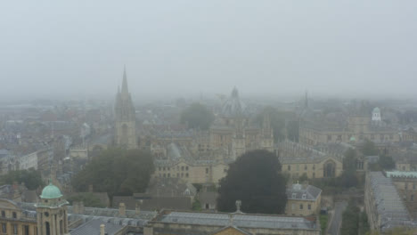 Drone-Shot-Pulling-Away-From-Buildings-In-Misty-Oxford-08