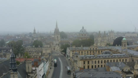 Drone-Shot-Panning-Across-Buildings-In-Misty-Oxford-01