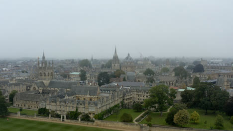 Drone-Shot-Panning-Across-Buildings-In-Misty-Oxford