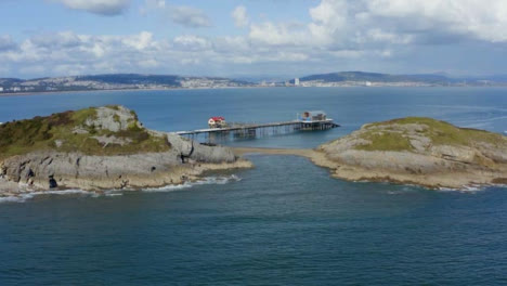 Drone-Shot-Lowering-Overlooking-Mumbles-In-Swansea-Pier-01-