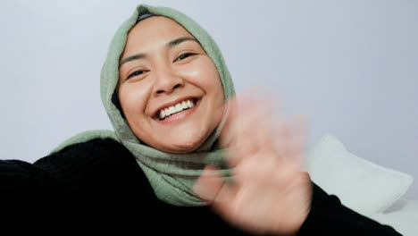 Female-Student-Waving-Talking-and-Waving-Directly-to-Camera