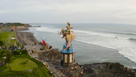 Drone-Shot-Orbiting-Gajah-Mina-Statue-