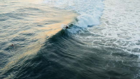 Drone-Shot-Following-Surfer-Riding-a-Wave