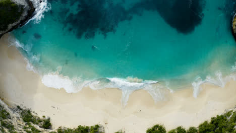 Drone-Shot-Descending-On-Tropical-Island-Beach-